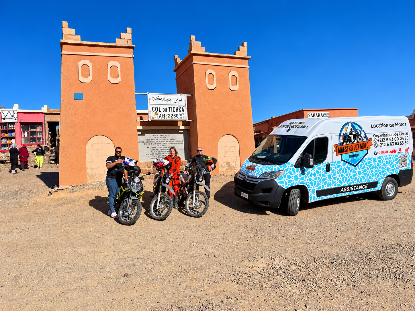 Motorcycle riders and the Maestro Lux Moto assistance van in Morocco